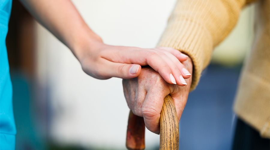 elder with caretaker